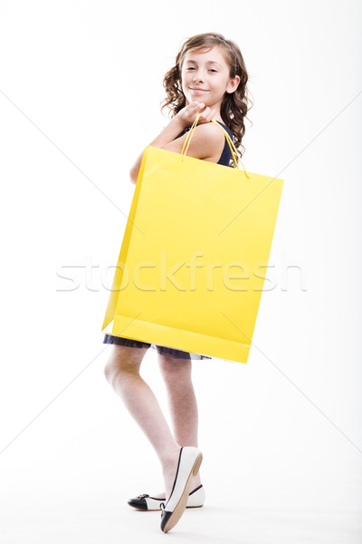 Kız sarı alışveriş çantası portre beyaz gururlu Stok fotoğraf © Giulio_Fornasar