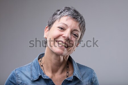 Vivacious senior woman with a lovely smile Stock photo © Giulio_Fornasar