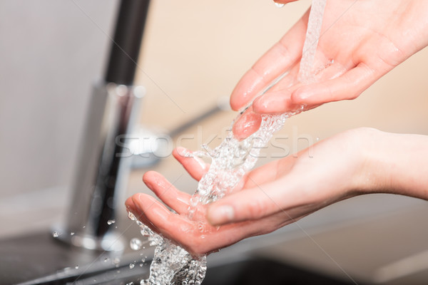 Primo piano mani acqua donna dita Foto d'archivio © Giulio_Fornasar