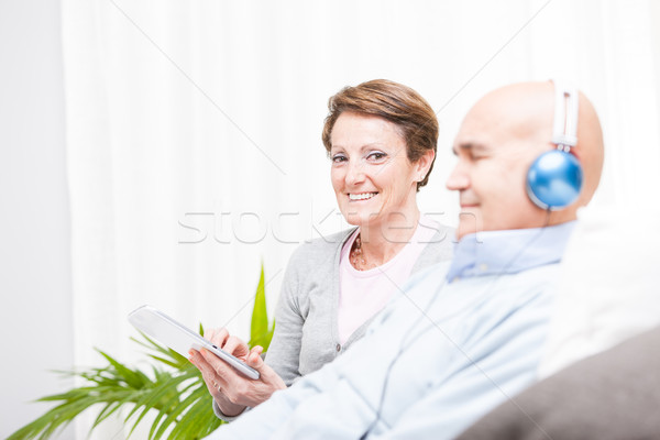 Relaxed contented middle-aged couple Stock photo © Giulio_Fornasar