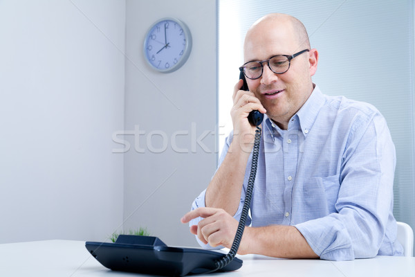 serene office worker on the telephone Stock photo © Giulio_Fornasar