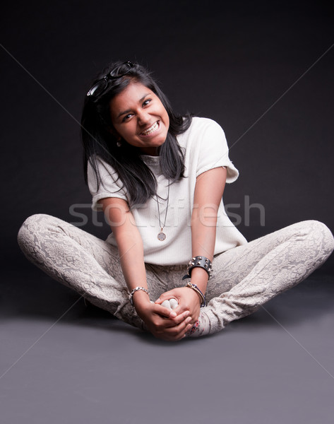 portrait of a crouched indian girl Stock photo © Giulio_Fornasar