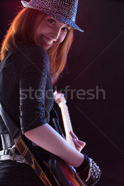 popstar woman smiling to you as playing guitar Stock photo © Giulio_Fornasar
