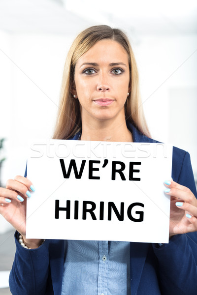 woman holding hiring sign in a worklace bacground Stock photo © Giulio_Fornasar