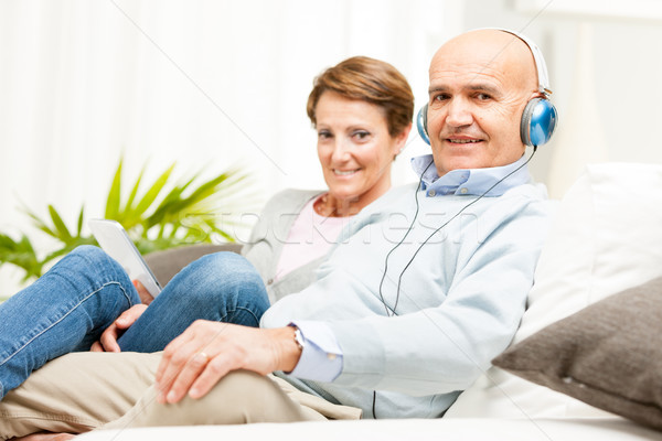 Couple relaxing together listening to music Stock photo © Giulio_Fornasar