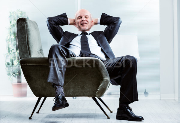 Businessman sitting relaxing and de-stressing Stock photo © Giulio_Fornasar