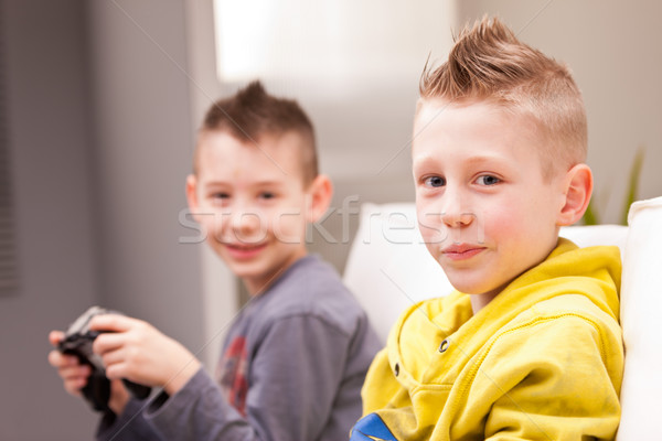 two kids playing video games Stock photo © Giulio_Fornasar