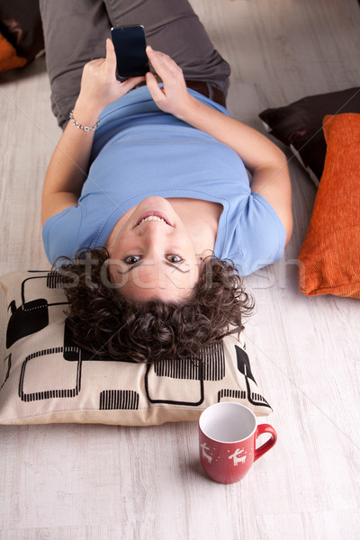 Christmas texting on her mobile for this girl Stock photo © Giulio_Fornasar