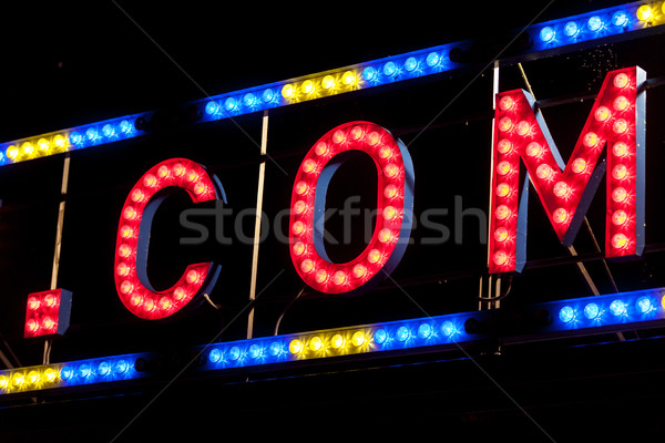 electric .COM sign on a scaffolding in the night Stock photo © Giulio_Fornasar