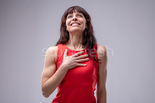 Happy hopeful woman or lady in love Stock photo © Giulio_Fornasar