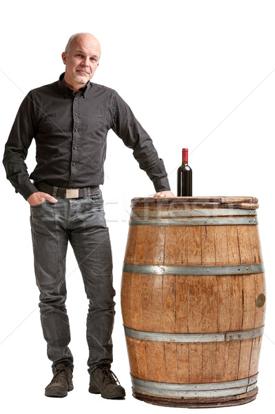 Viticulture concept with a man, barrel and wine Stock photo © Giulio_Fornasar