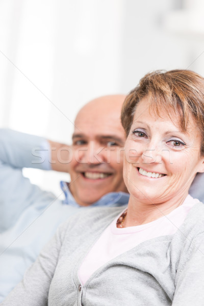 Smiling friendly woman relaxing with her husband Stock photo © Giulio_Fornasar