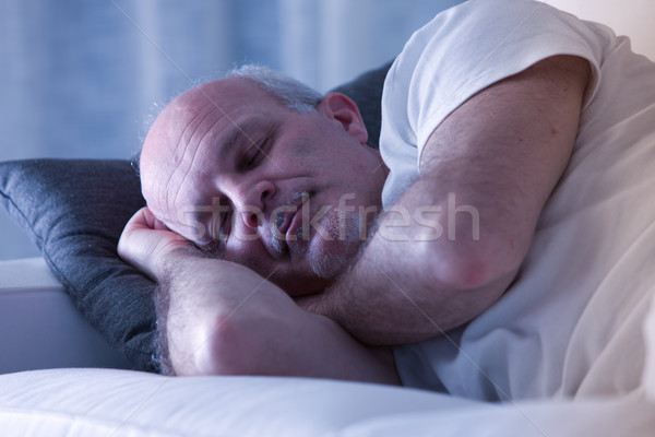 man sleeping on his couch Stock photo © Giulio_Fornasar