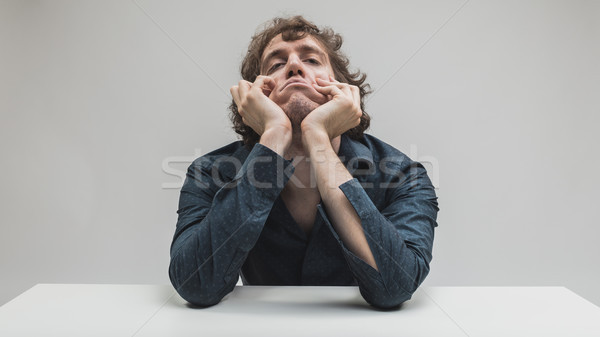 portrait of young bored man thinking Stock photo © Giulio_Fornasar