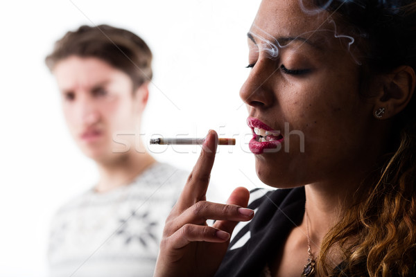 Imagine de stoc: Femeie · fumat · ţigară · dezamagit · om · dezamagire