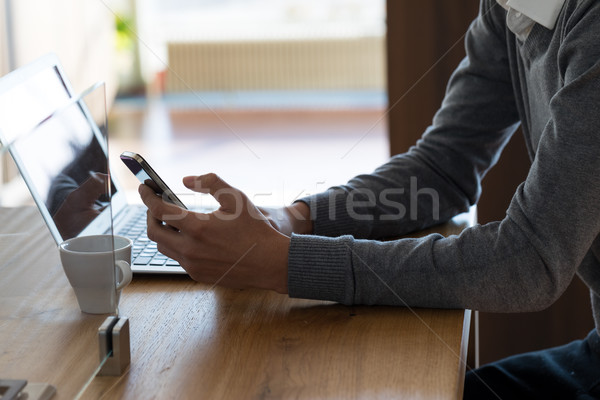 Incognito businessman with cell Stock photo © Giulio_Fornasar