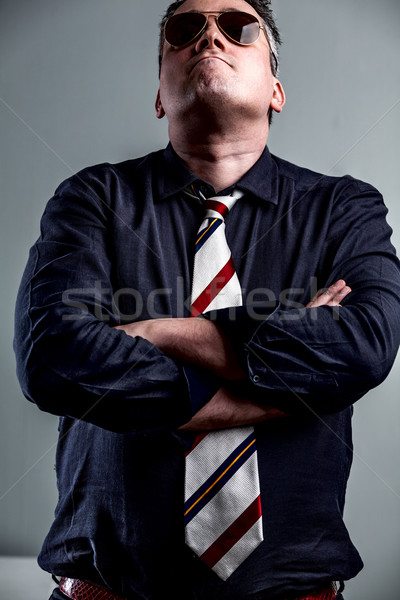 manager standing with his amrs folded in military style Stock photo © Giulio_Fornasar