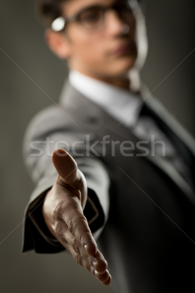 businessman rising out his hand to shake yours Stock photo © Giulio_Fornasar