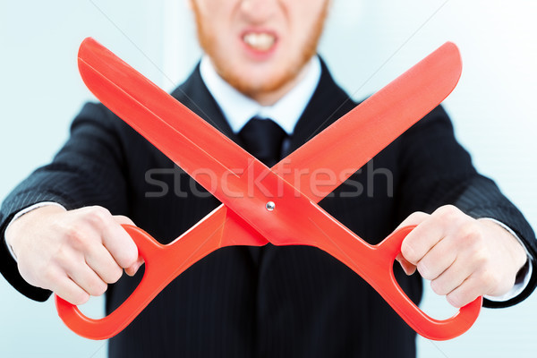 Man holding big red scissors Stock photo © Giulio_Fornasar