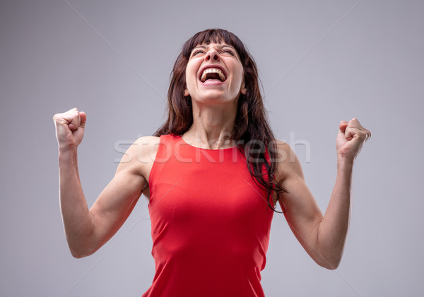 Izgatott nő ünnepel fej hát kiabál Stock fotó © Giulio_Fornasar