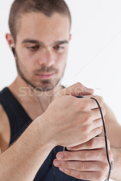 young athlete checking out his playlist Stock photo © Giulio_Fornasar