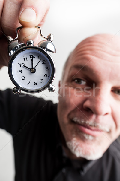 Stock photo: wideangle closeup man with time passing