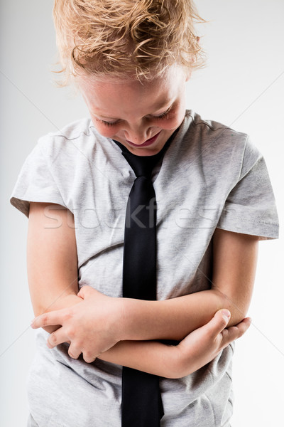 business kid keeping from laughing out loud Stock photo © Giulio_Fornasar