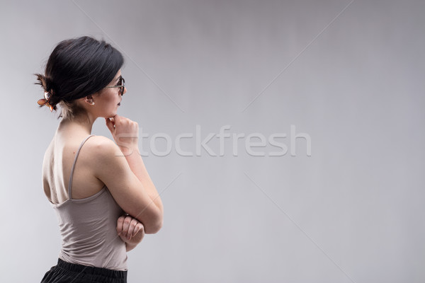 Young brunette woman looking at copy space Stock photo © Giulio_Fornasar