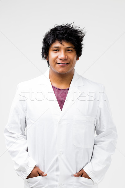 Stock photo: South American man on a white coat