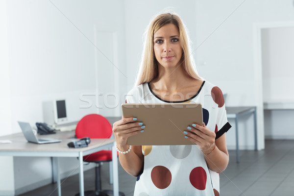 Stock photo: real woman in a realistic office