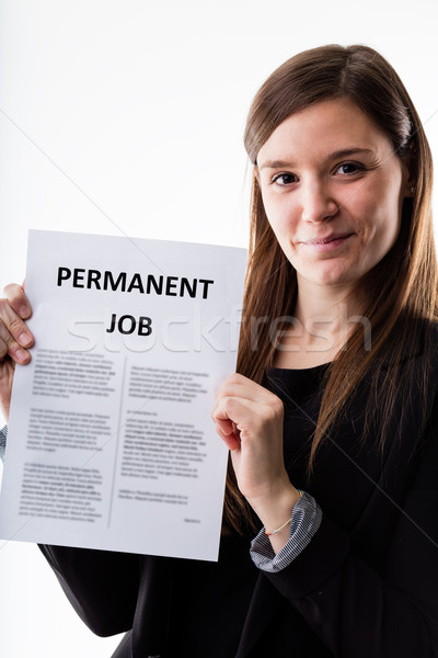 woman proudly holding her job contract Stock photo © Giulio_Fornasar