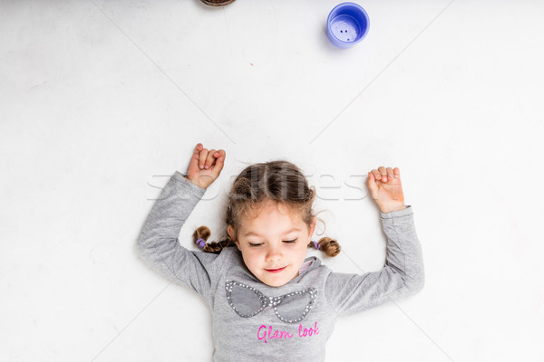 little girl on a slightly dirty white background Stock photo © Giulio_Fornasar