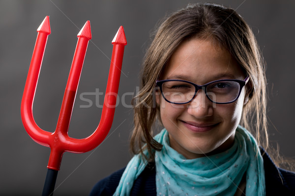 little girl with a big pitchfork Stock photo © Giulio_Fornasar