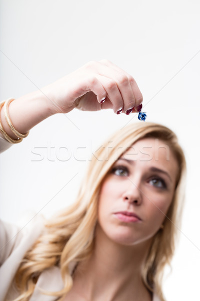 unsatisfying gift held by a sad woman Stock photo © Giulio_Fornasar