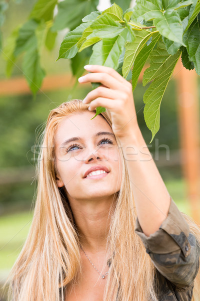 girl outdoors touching a leaf Stock photo © Giulio_Fornasar