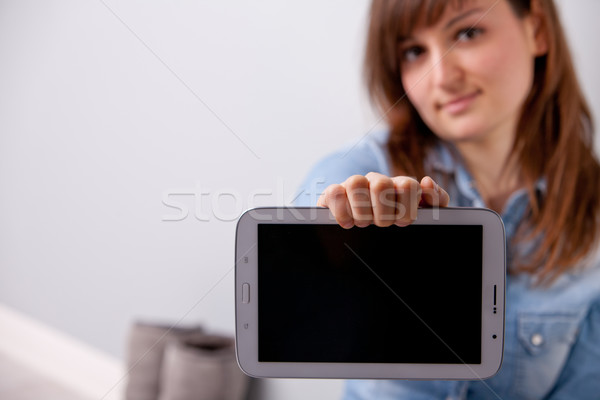 girl showing COPY SPACE in her tablet'screen Stock photo © Giulio_Fornasar