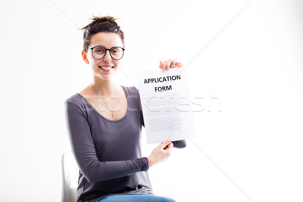 woman showing an application form Stock photo © Giulio_Fornasar