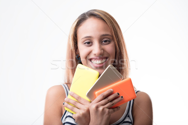 Stock photo: phone addicted girl having fun with her beloved smartphone