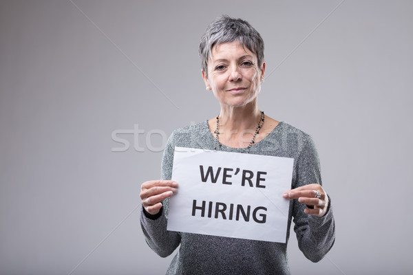 Personnel manageress holding up a sign Stock photo © Giulio_Fornasar
