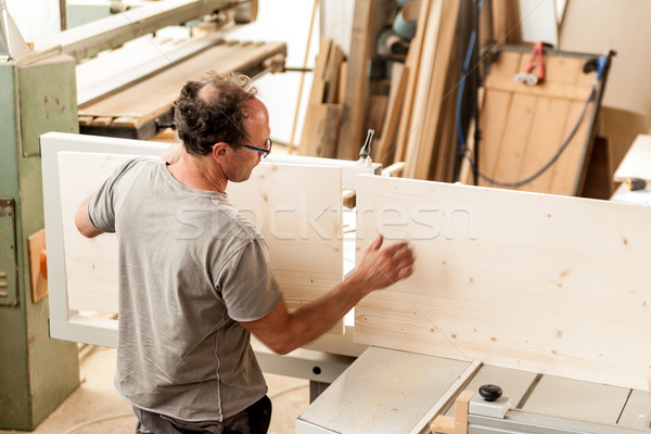 woodworker assembling a piece of furniture Stock photo © Giulio_Fornasar