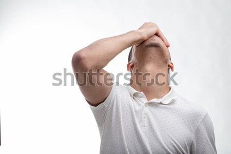 Man covering his face with his hand Stock photo © Giulio_Fornasar