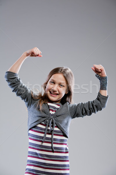 I'm the strongest girl in the world Stock photo © Giulio_Fornasar