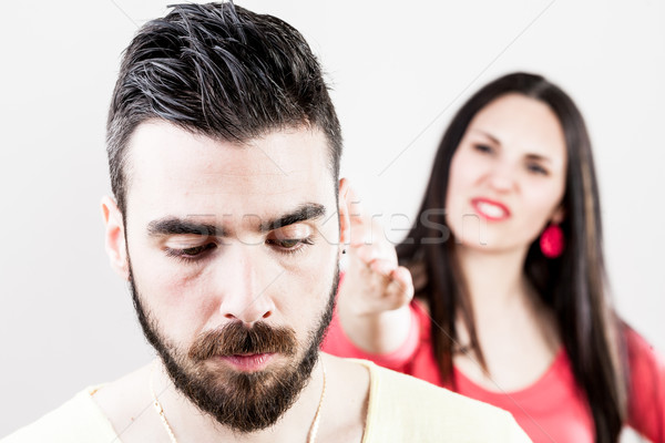 man suffering about a woman despising him Stock photo © Giulio_Fornasar