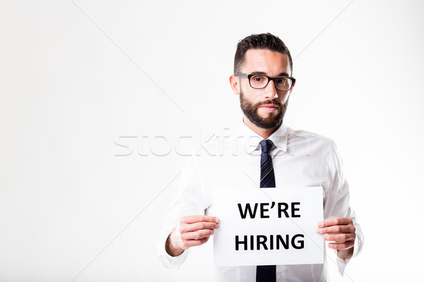we're hiring sign shown by a businessman Stock photo © Giulio_Fornasar