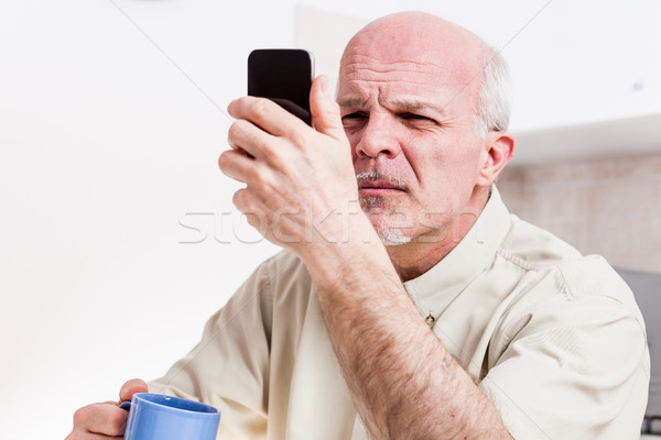 senior man has problems with his vision Stock photo © Giulio_Fornasar