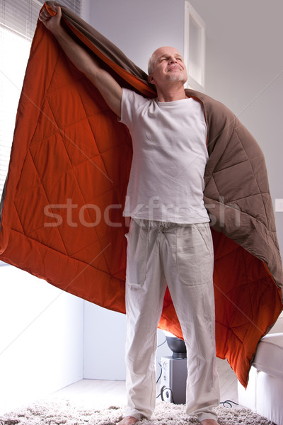 joking man uses quilt as a cloak Stock photo © Giulio_Fornasar
