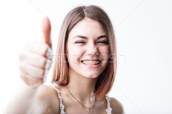 beutiful girl OK with her retainer Stock photo © Giulio_Fornasar