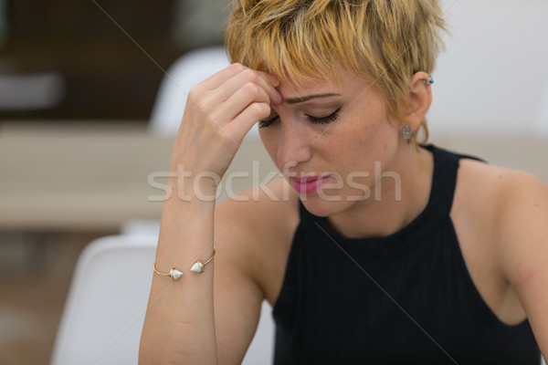 Aggódó fiatal nő feszültség fejfájás tart kéz Stock fotó © Giulio_Fornasar