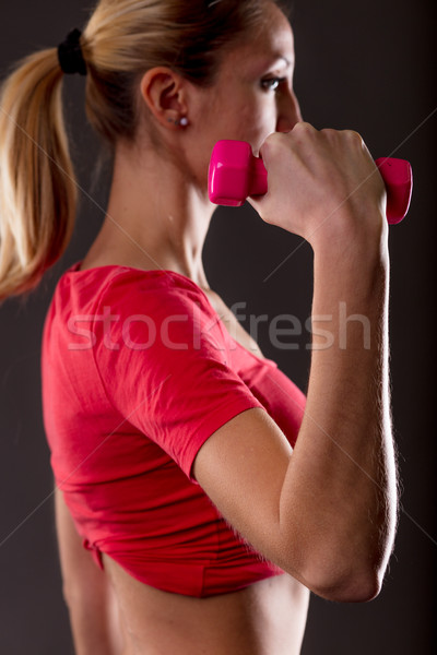 Vrouw gewichtheffen focus arm blond Stockfoto © Giulio_Fornasar
