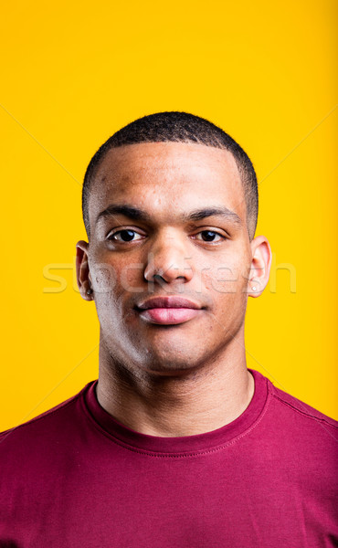 Retrato homem negro amarelo roxo tshirt Foto stock © Giulio_Fornasar